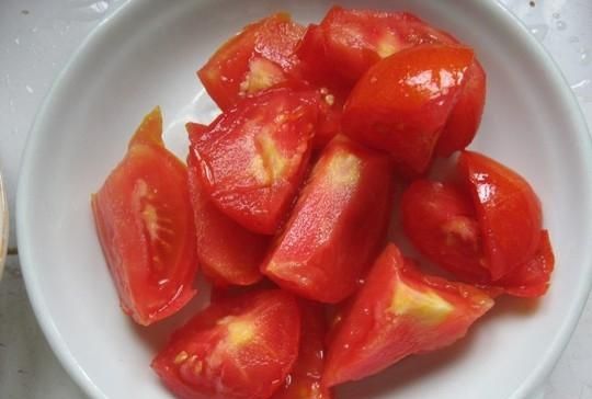 西红柿炒卷心菜的做法是什么图13