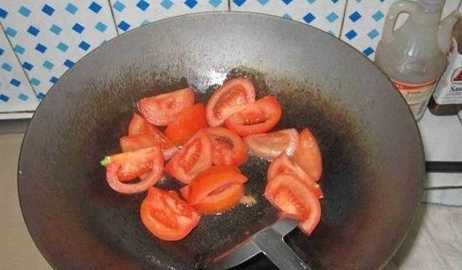 西红柿炒卷心菜的做法是什么图14